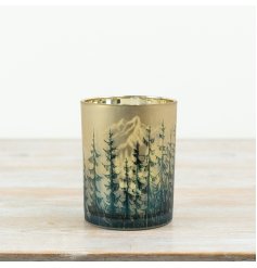 A charming tree green and gold candle holder 