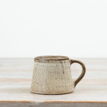 This 11.5cm ceramic mug features a beautifully textured neutral glaze with a soft speckled finish.