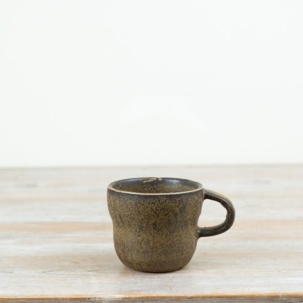 Introduce earthy, artisan character to your range with this rustic stoneware mug.
