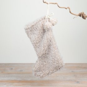 Add a cosy, textured accent to festive displays with this plush Christmas stocking. 