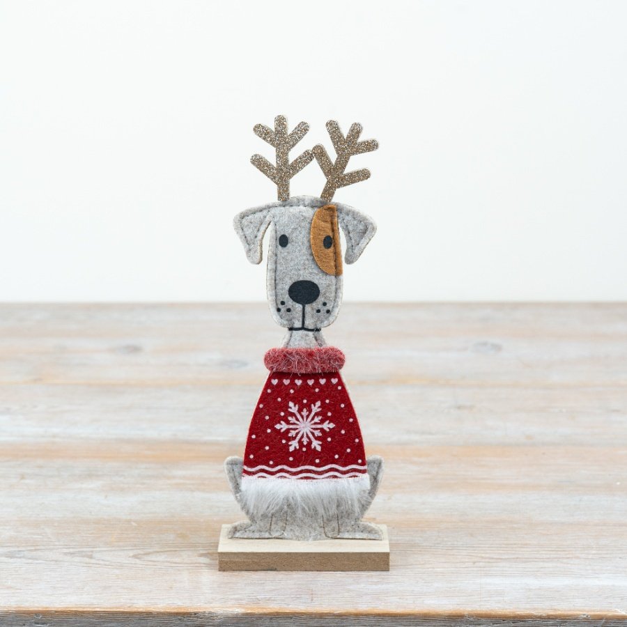 Adorable felt ornament featuring a cute dog design.