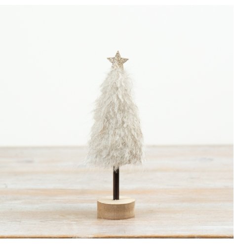 A soft and stylish Christmas tree decoration featuring a fluffy neutral finish