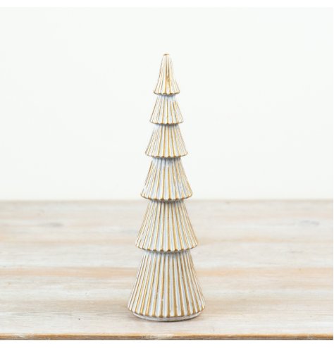 A festive polyresin tree decoration with a whitewash finish and gold trim detailing.