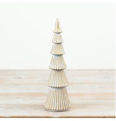A decorative polyresin tree ornament featuring a whitewash finish with gold trim detailing.