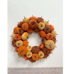 Chic autumn pumpkin wreath for seasonal decor.