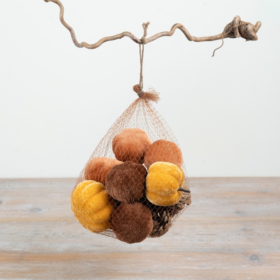 Bring warm autumn vibes to your space with this Velvet Pumpkin and Pinecone decor set.