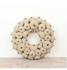 Bring warmth to your space with this chic cream pumpkin wreath, perfect for a cozy home vibe.