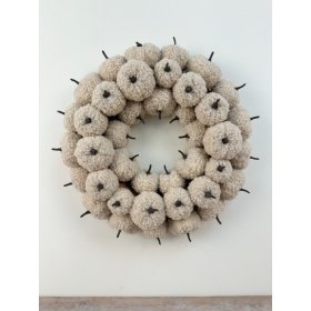 Add soft seasonal texture to your collection with this beautifully crafted neutral pumpkin wreath.