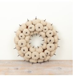 This pumpkin wreath’s layered design adds depth and style, making it a striking home decor accent.