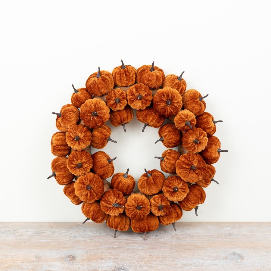 Bring instant autumn warmth to seasonal displays with this pumpkin wreath.