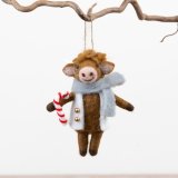 A delightful felt Highland cow complete with scarf