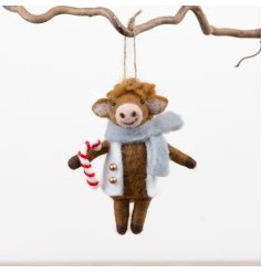 A 13cm felt Highland cow decoration featuring a soft textured finish,