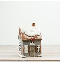 This Candle House is a charming piece that adds a warm, cosy glow to any space.