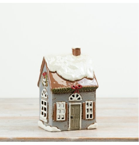 Add a cosy and welcoming glow to your home with this delightful Candle House