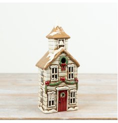 This charming piece casts a warm glow, creating a cozy and inviting atmosphere in any space.