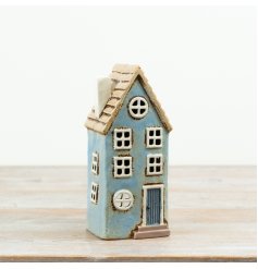 Finished in a muted coastal blue tone with rustic edging