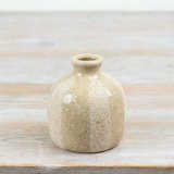 Add natural elegance to your space with this Ceramic Stripped Earthy Vase