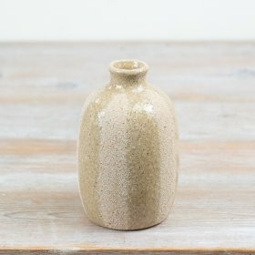 A beautiful vase with a glossy striped finish.