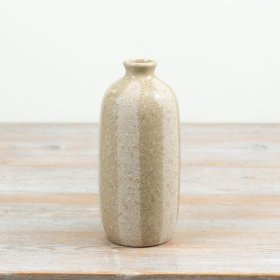 an elegant striped vase with a natural handcrafted feel
