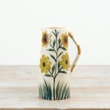 Add a splash of sunshine to your space with this Tall Sunflower Jug Vase