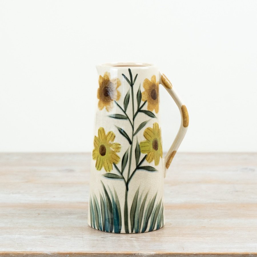 Brighten your room with this tall sunflower jug vase, adding a cheerful touch to any space.