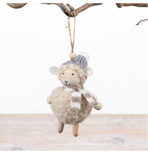 Bring a warm woodland charm to your collection with this adorable sheep hanging Christmas ornament.