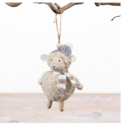 Bring a warm woodland touch to your decor with this adorable sheep hanging Christmas ornament.