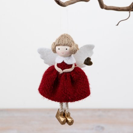 Bring festive charm to your decor with this elegant angel hanging decoration, perfect for seasonal displays.