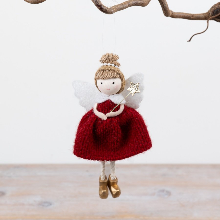 Add a graceful festive accent to seasonal displays with this charming angel hanging decoration.