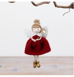 Bring festive cheer to your decor with this charming angel hanging ornament.