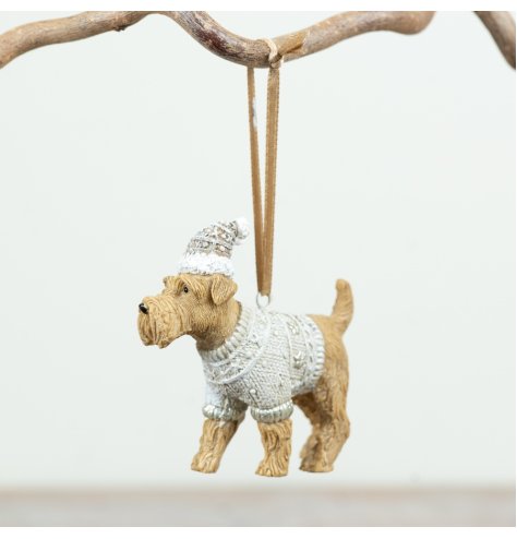 Endearing dog dressed in a Christmas jumper and hat with a rustic jute hanging loop