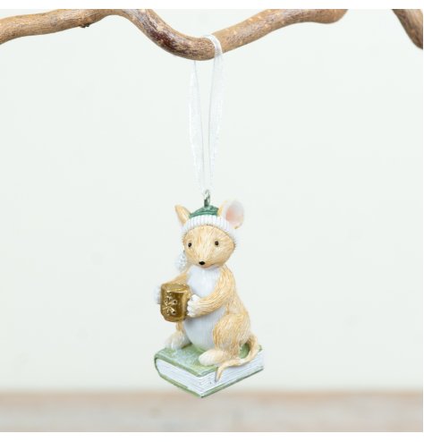 Endearing classic mouse perched on a book, ideal for adding cosy character to any room