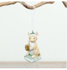 Charming traditional mouse on a book ornament perfect for adding warmth to any space