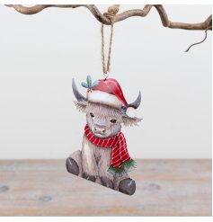 Bring festive cheer to your decor with this charming Highland cow hanging ornament.