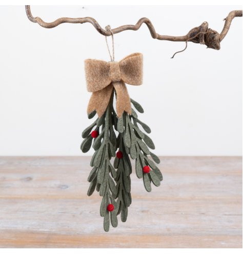 A festive felt hanging decoration featuring holly-style foliage,