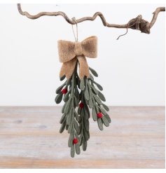 A decorative hanging ornament featuring felt foliage with red berry accents and a fabric bow.