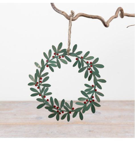 Give your door a festive charm with this green metal wreath hanger.