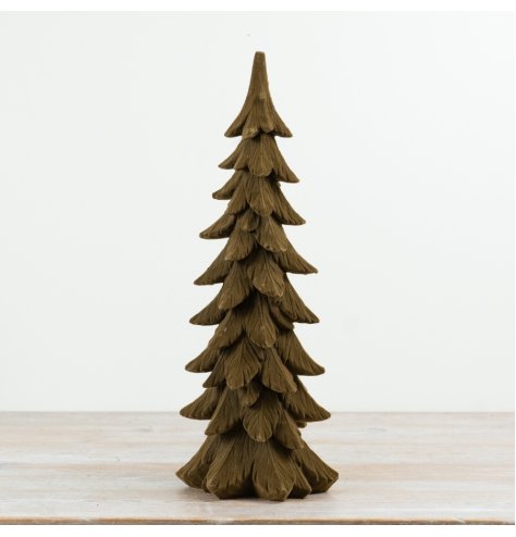A tall statement Christmas tree ornament with a realistic wood-look finish and detailed layered branch design.