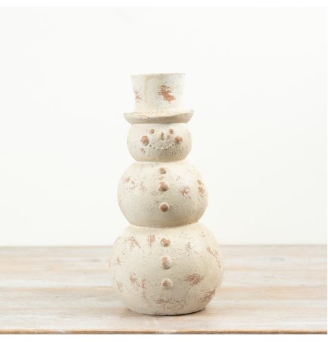 Add classic holiday charm with this distressed cream snowman ornament to your festive decor.