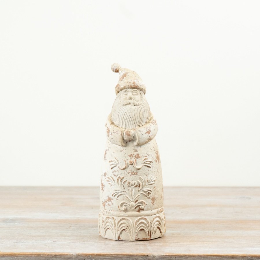 Add timeless charm to your Christmas collection with this distressed cream Santa ornament. 