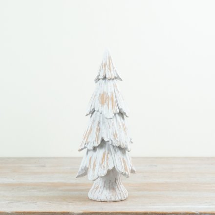 Enhance your decor with this resin tree featuring a stylish white wood finish for a natural touch.