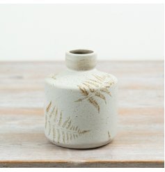 Enhance your space with this stylish ceramic vase featuring a graceful leaf design.