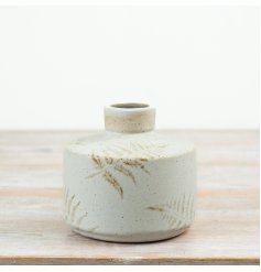 Add charming botanical flair to your space with this elegantly designed ceramic decorative vase.