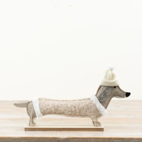 Bring warmth to your space with this adorable dog-themed decoration.