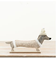 Bring warmth to your space with this adorable dog ornament.