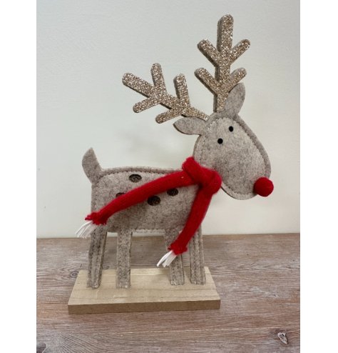 Bring holiday cheer to your space with this cozy felt reindeer ornament.