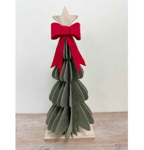a stylish felt tree with red bow and wooden star 