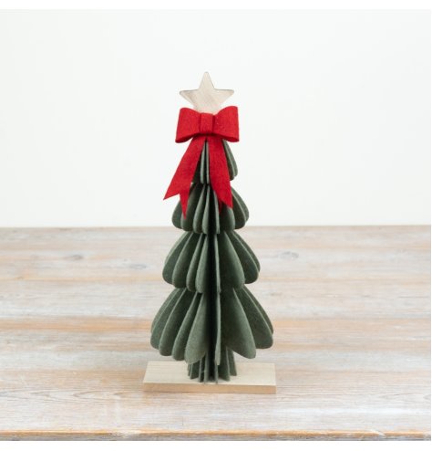 a stylish felt tree with red bow and wooden star 