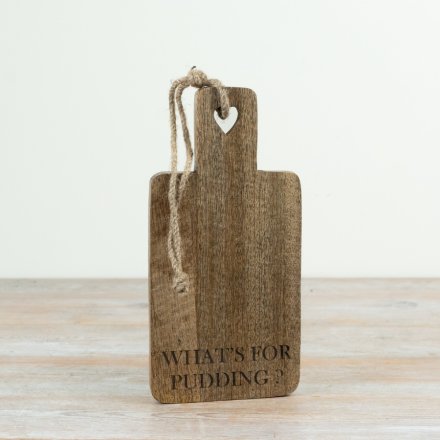 "Whats For Pudding" wooden board brings a charming rustic heart detail to your kitchen decor.