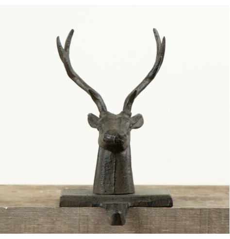 A statement festive accessory crafted in solid cast iron with an imposing stag head design.